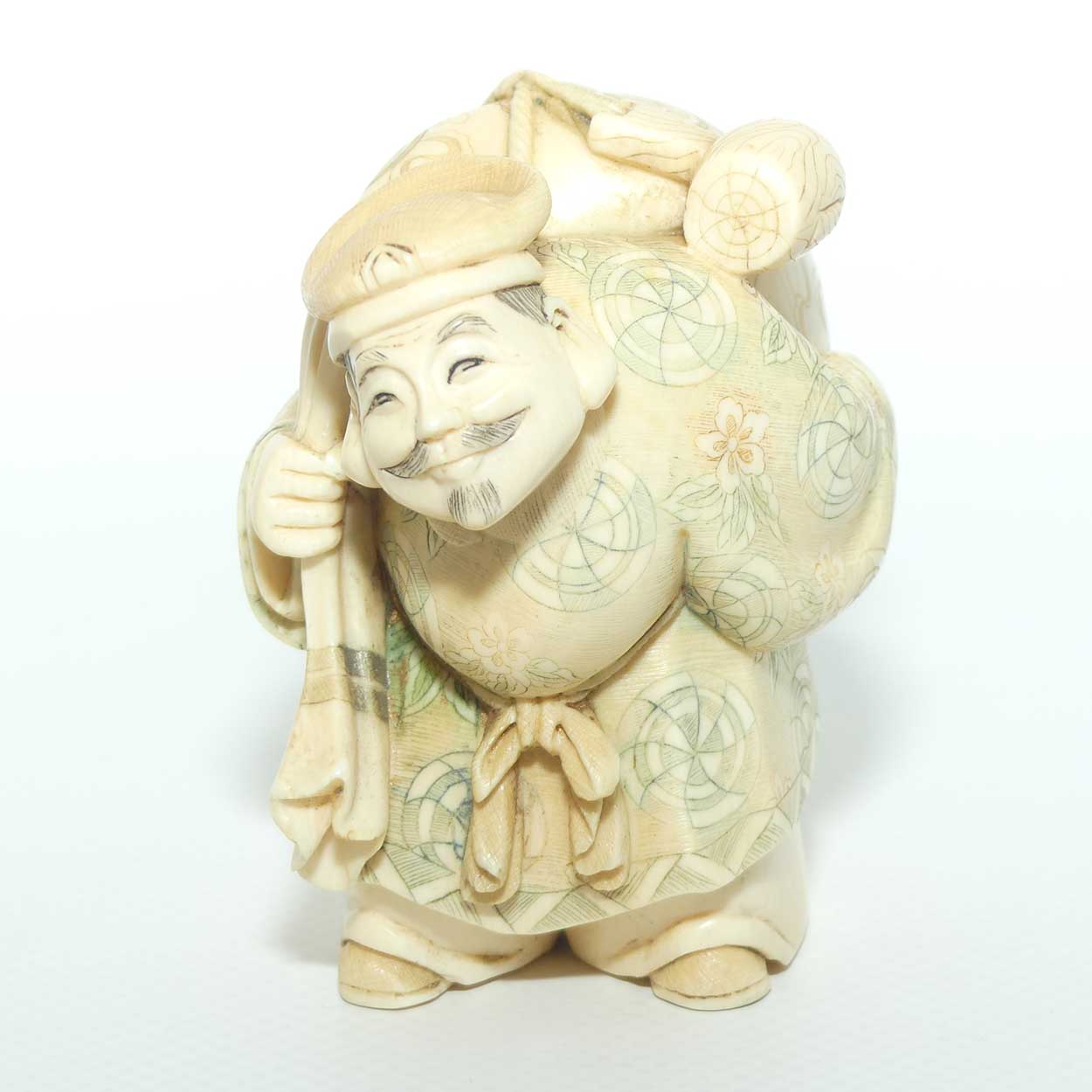 Japanese Carved Ivory Okimono figure | Travelling Man Carrying large Sack