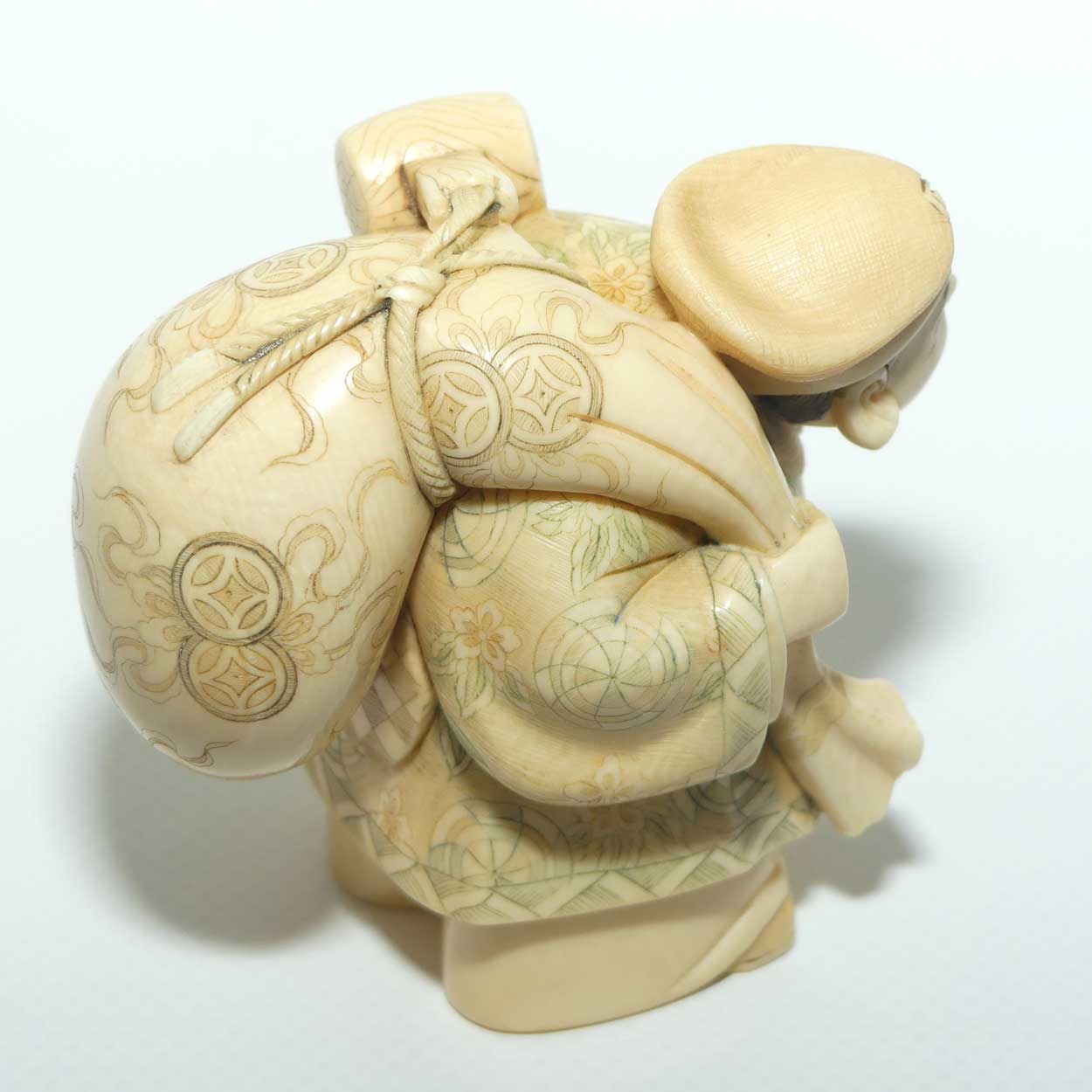 Japanese Carved Ivory Okimono figure | Travelling Man Carrying large Sack