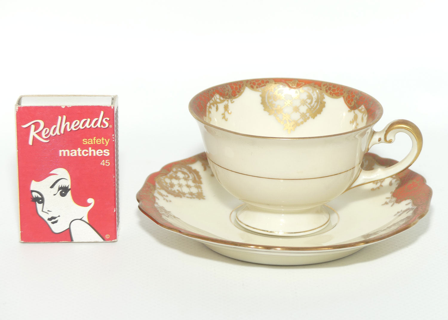 Hutschenreuther Germany demi tasse duo | Red trim with Gilt Overlay