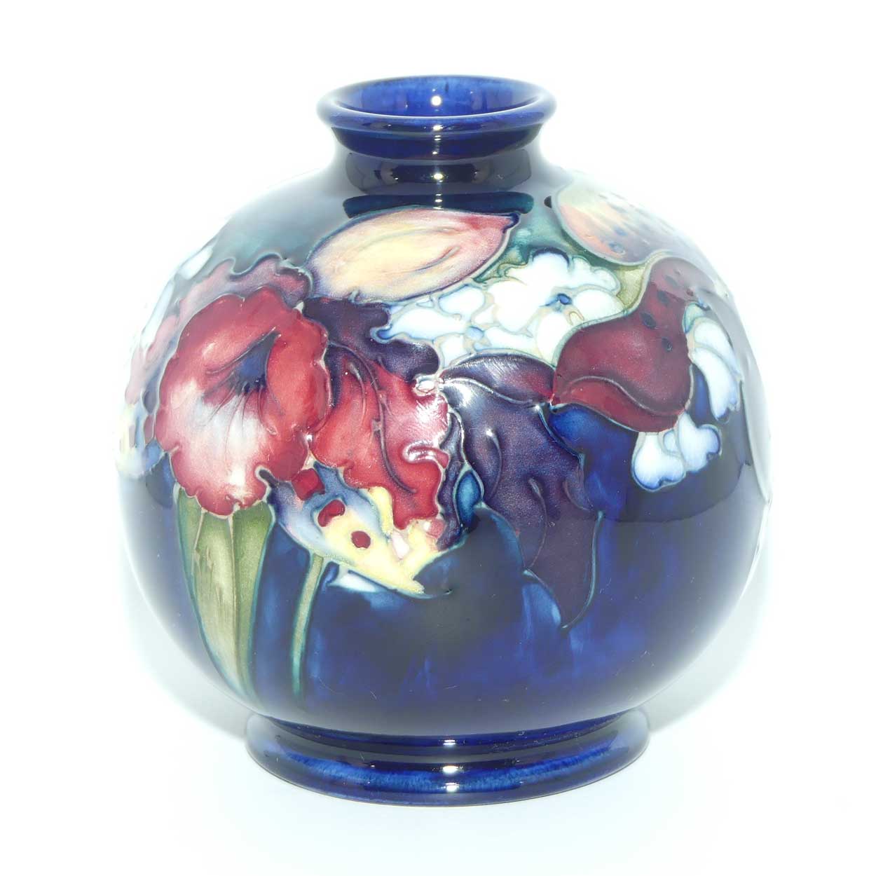 Walter Moorcroft Orchid on Dark Blue Ground ball vase | Shape 41/4