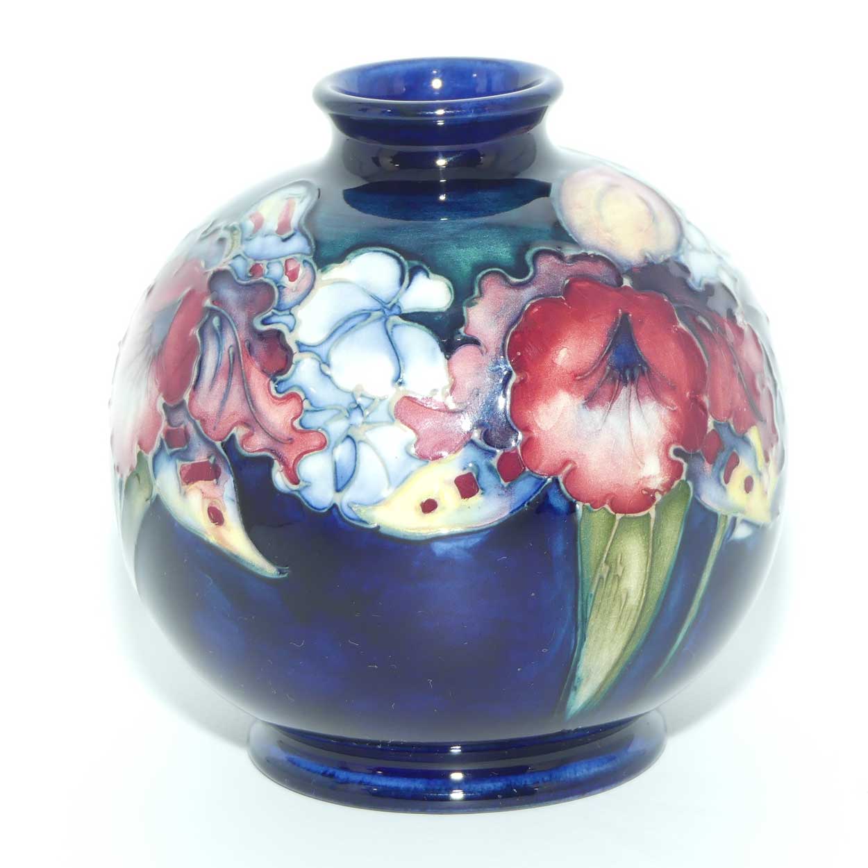 Walter Moorcroft Orchid on Dark Blue Ground ball vase | Shape 41/4
