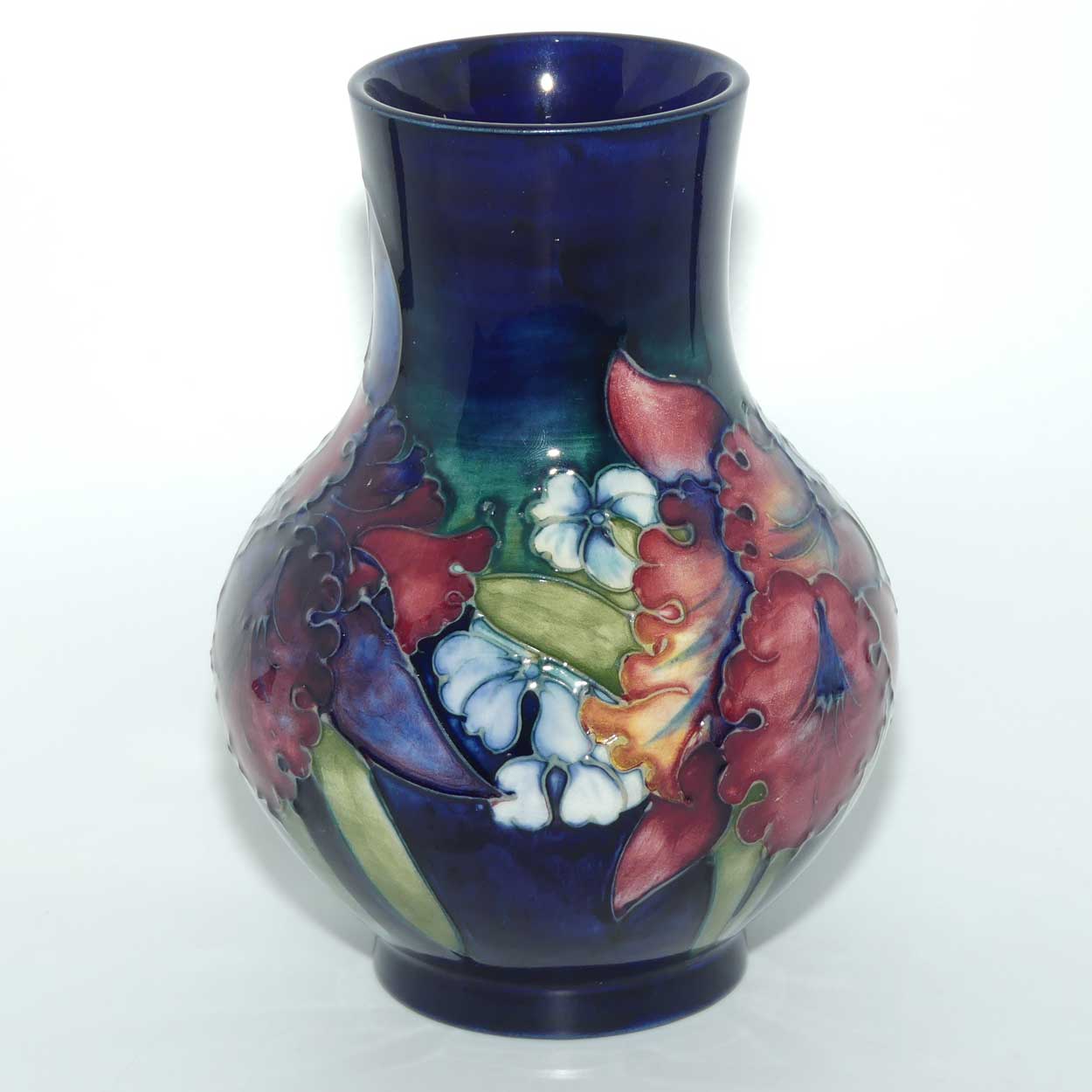 Walter Moorcroft Orchid on Blue Ground bulbous vase | Medium