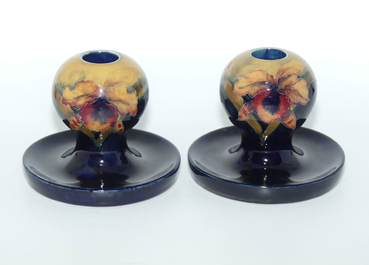 William Moorcroft Orchid on Ochre Ground Globular candlesticks