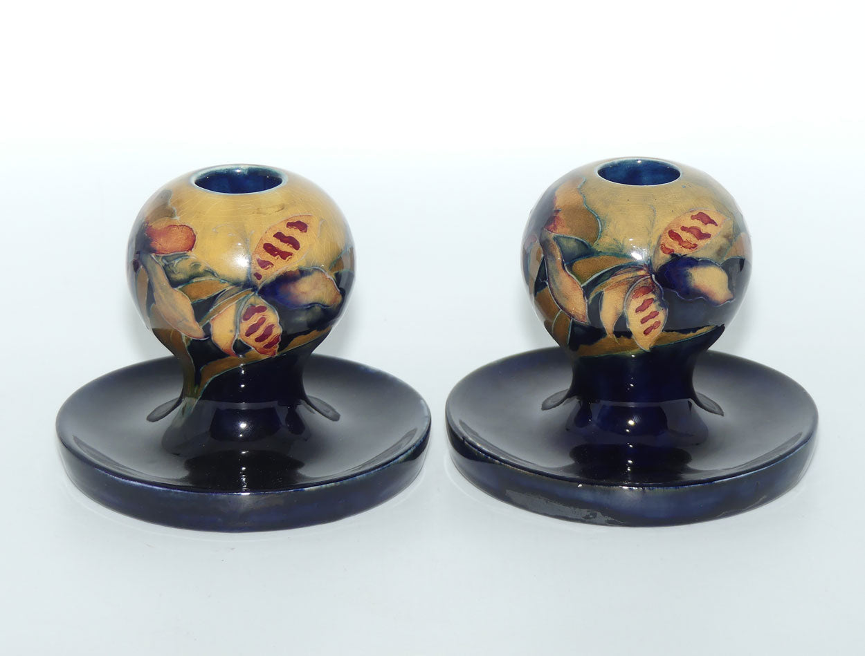 William Moorcroft Orchid on Ochre Ground Globular candlesticks
