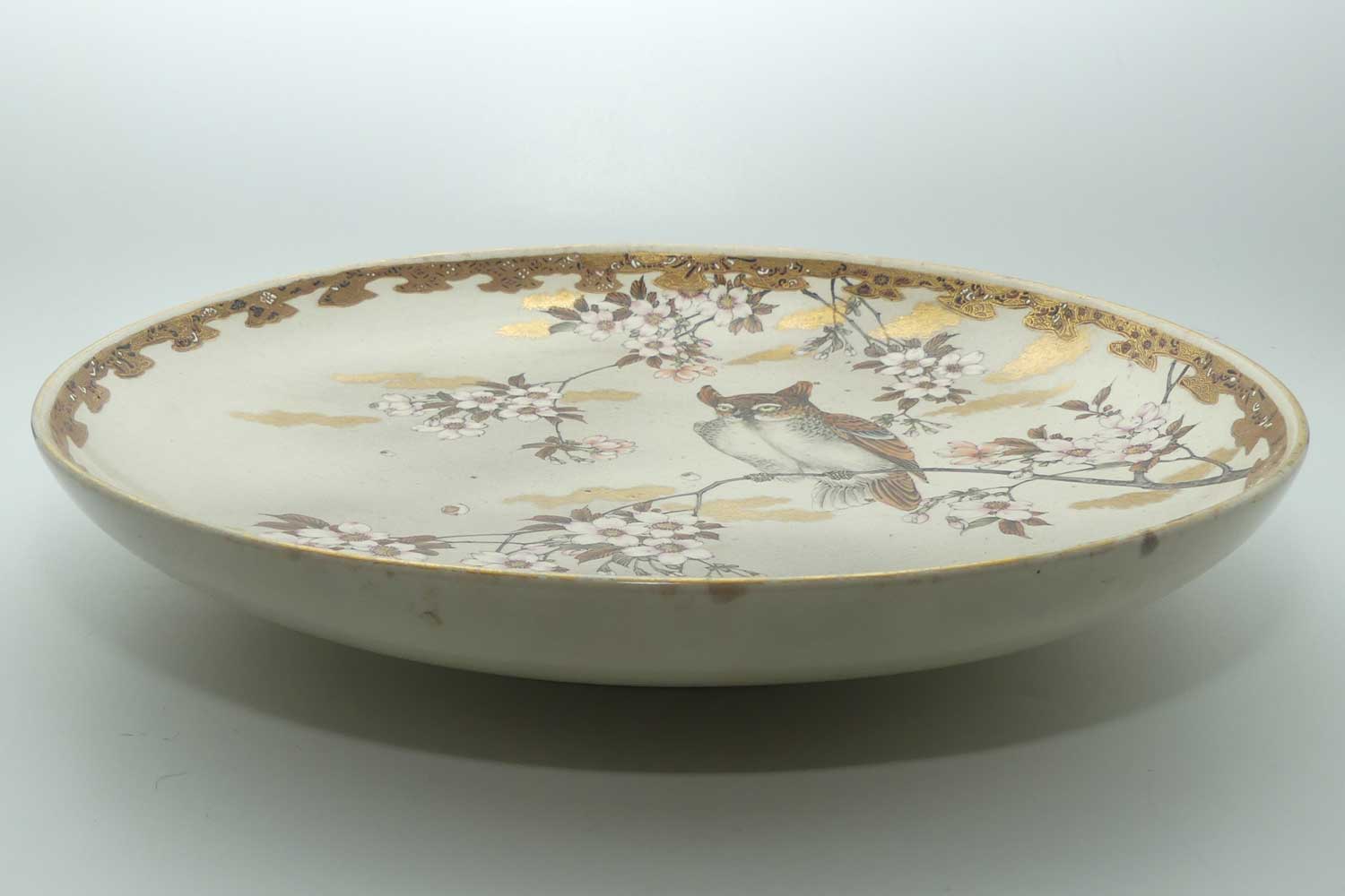 Antique Japanese Satsuma charger decorated with an Owl amongst Cherry Blossoms