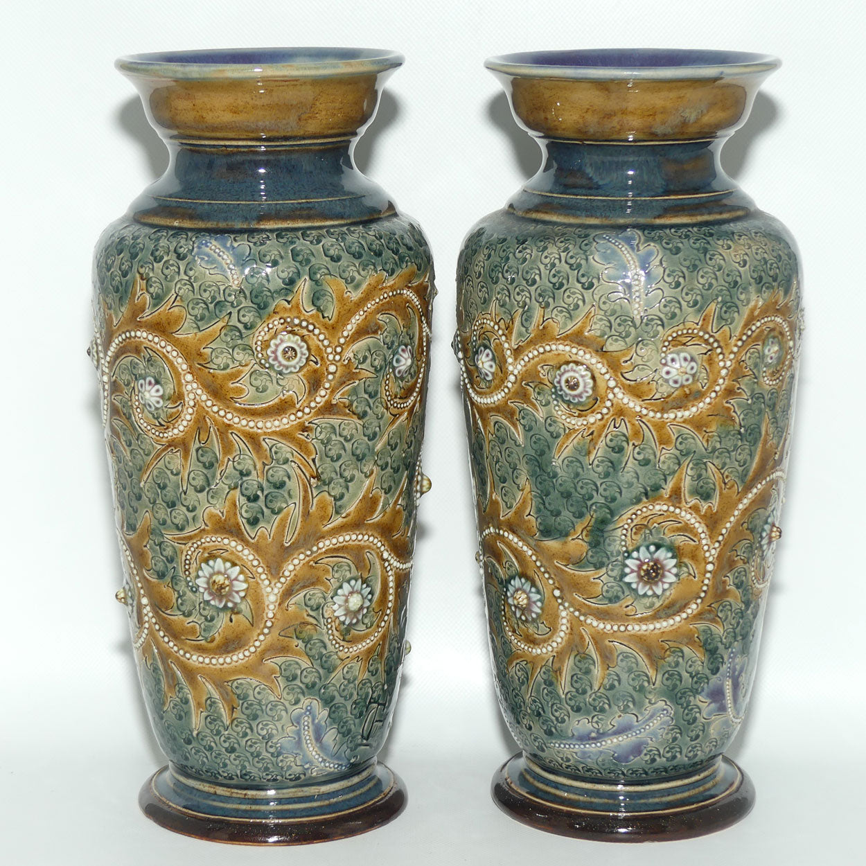Doulton Lambeth George Tinworth stoneware pair of conical vases with applied baguette beads and foliage