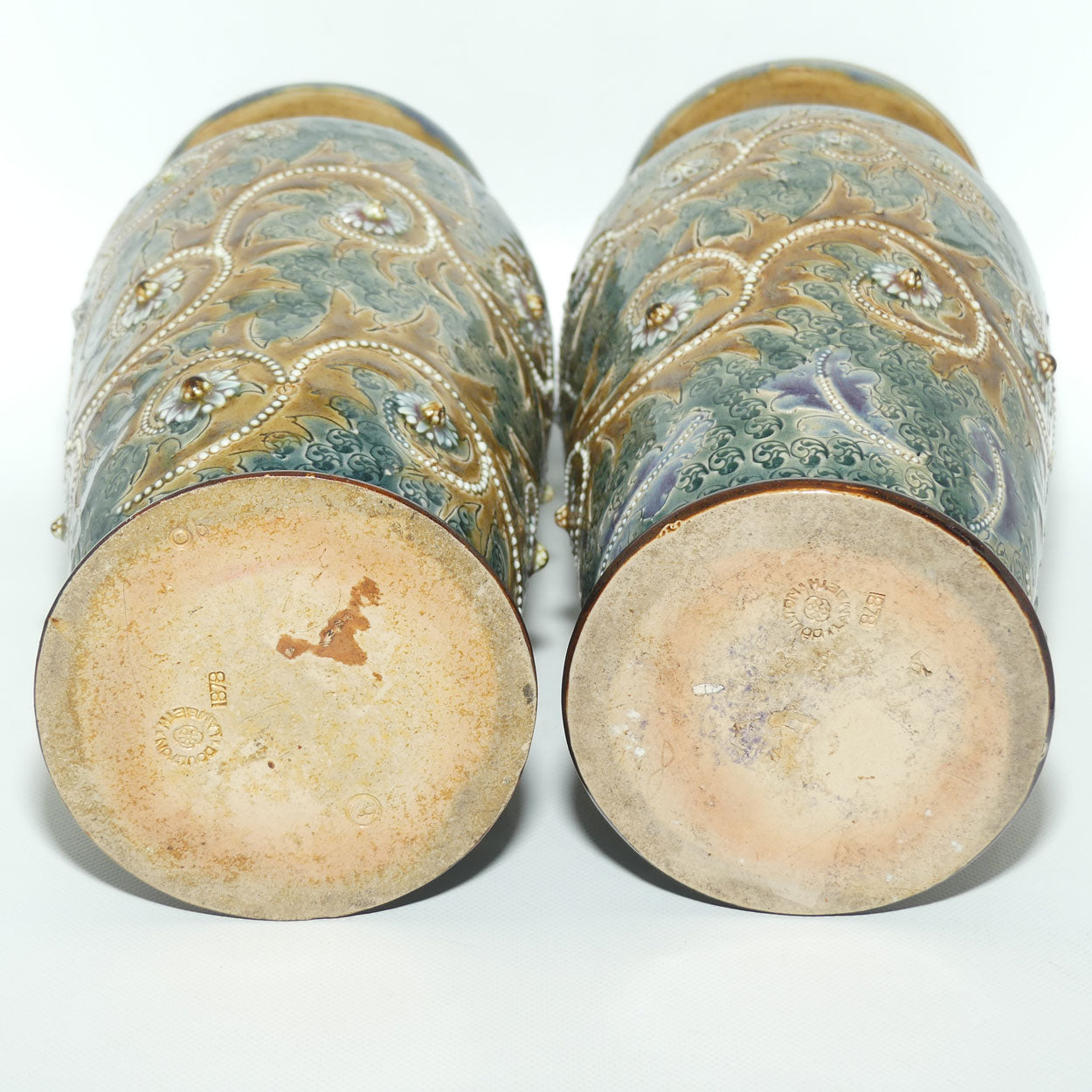Doulton Lambeth George Tinworth stoneware pair of conical vases with applied baguette beads and foliage