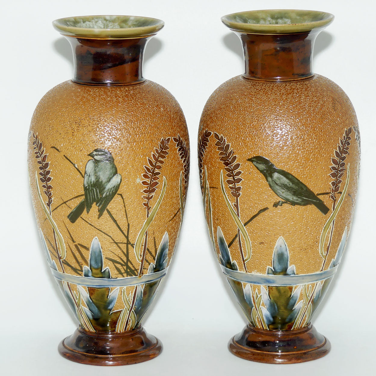 Doulton Lambeth Florence Barlow decorated pair of stoneware Vases featuring Birds amongst Ferns