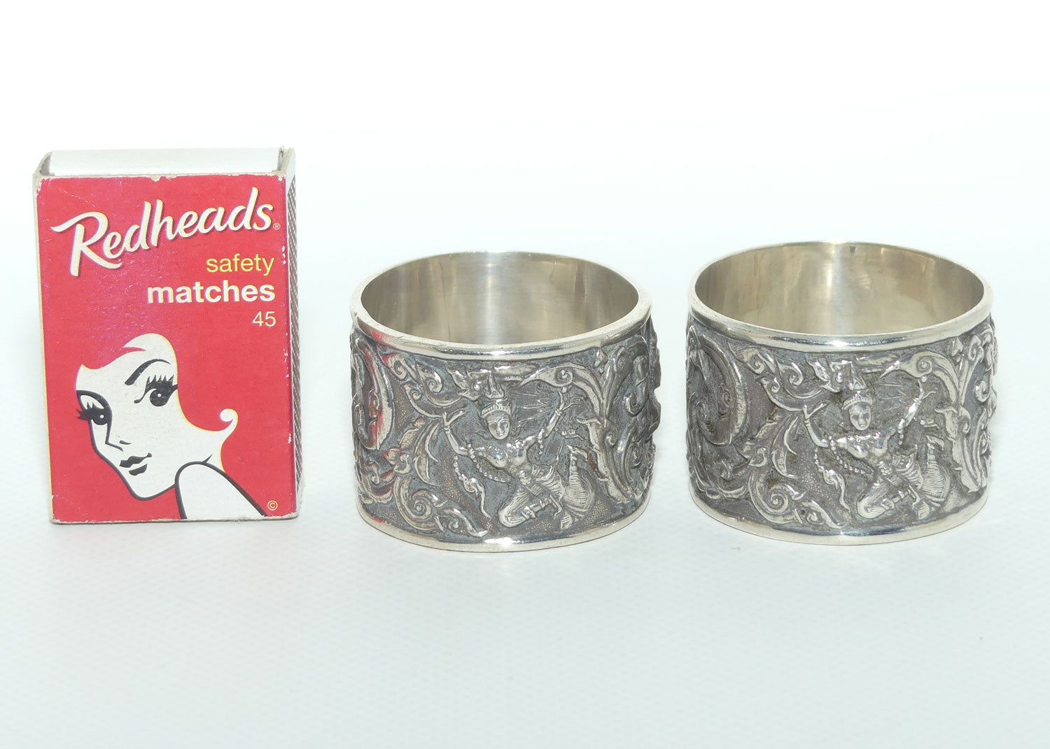 Pair of Heavily Embossed Siam Sterling Silver napkin or serviette rings | 52.15g the pair