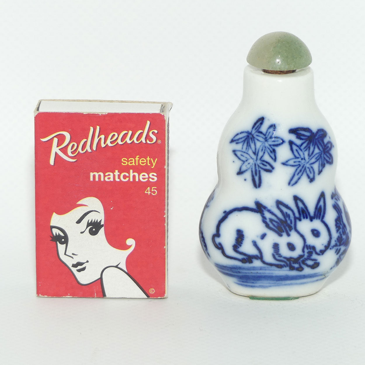 Chinese snuff bottle with greenstone stopper | Pair of Rabbits