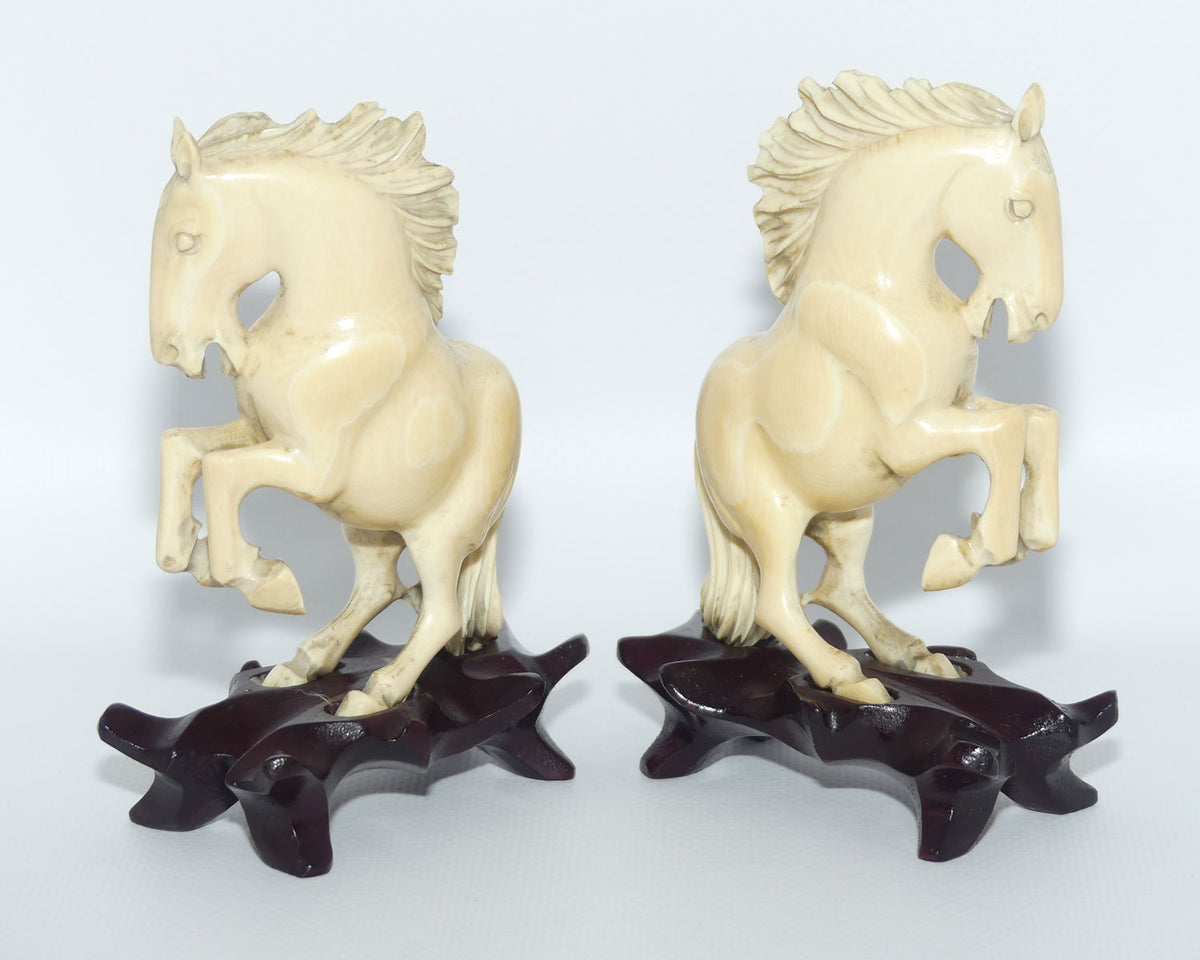 Carved Ivory pair of figures on matched bases | Rearing Horses