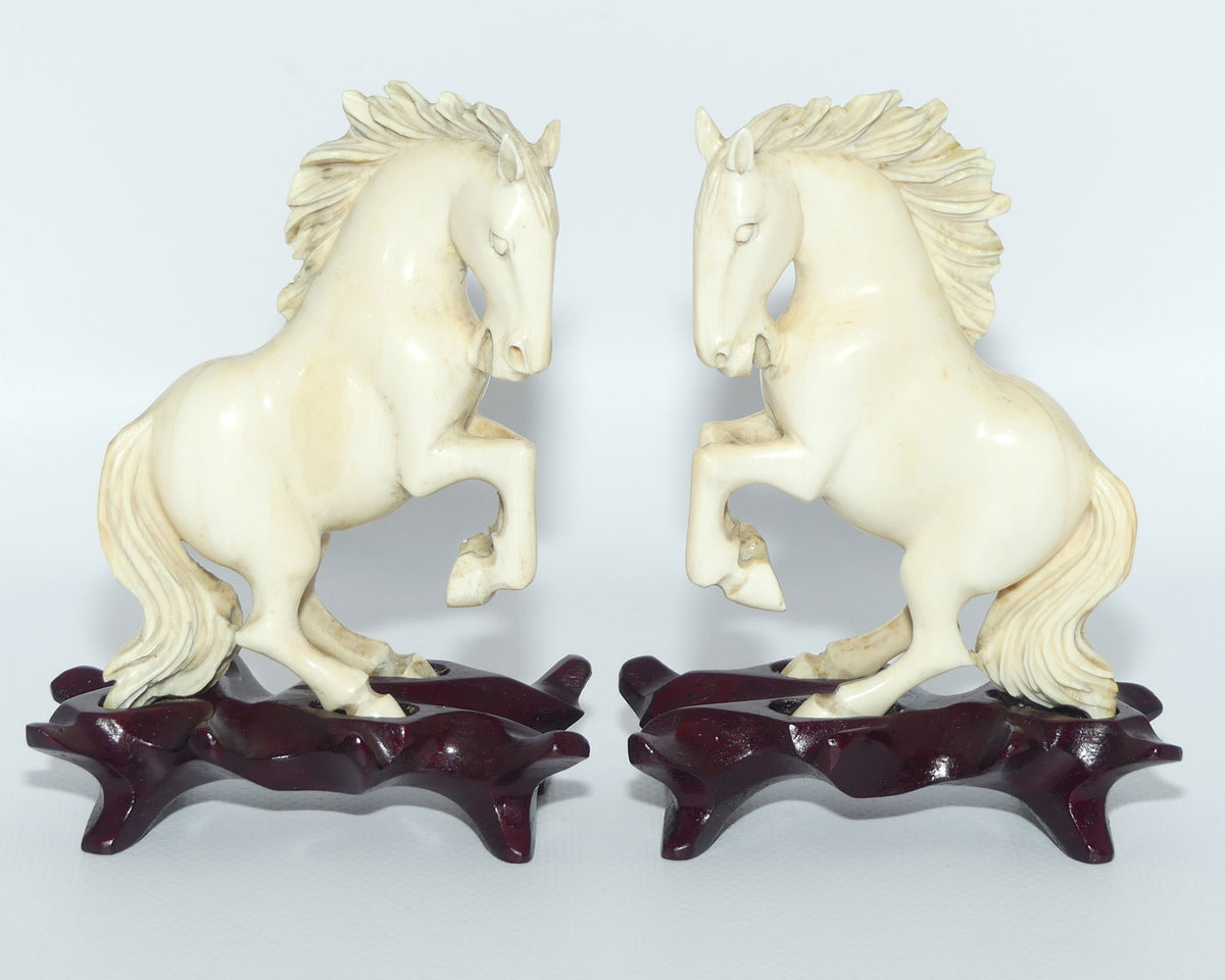Carved Ivory pair of figures on matched bases | Rearing Horses