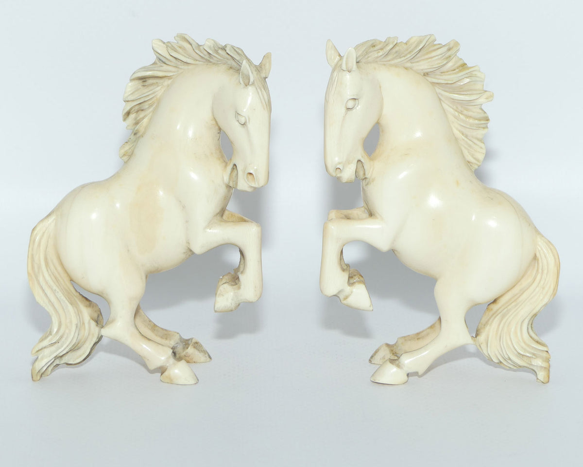 Carved Ivory pair of figures on matched bases | Rearing Horses