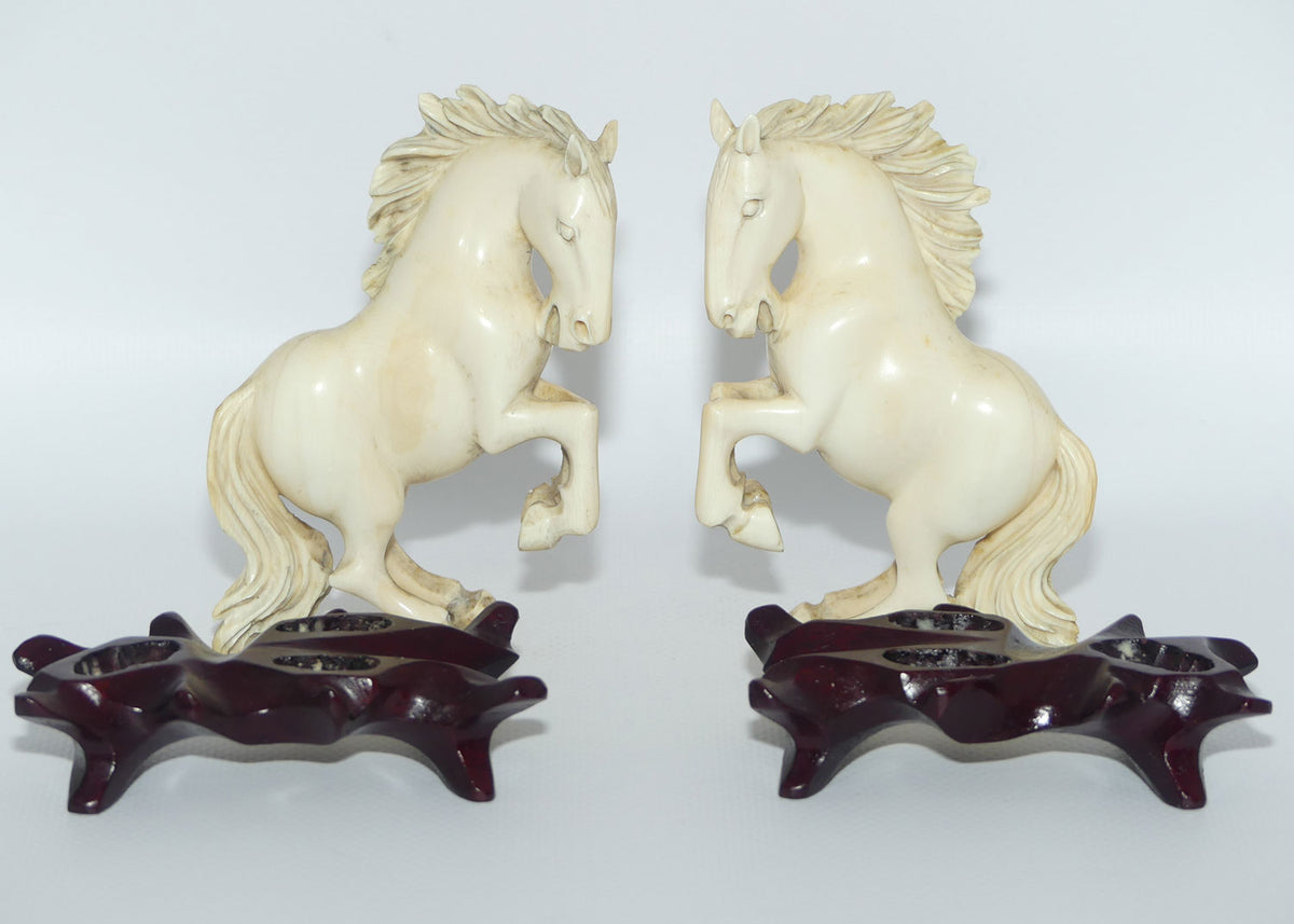 Carved Ivory pair of figures on matched bases | Rearing Horses