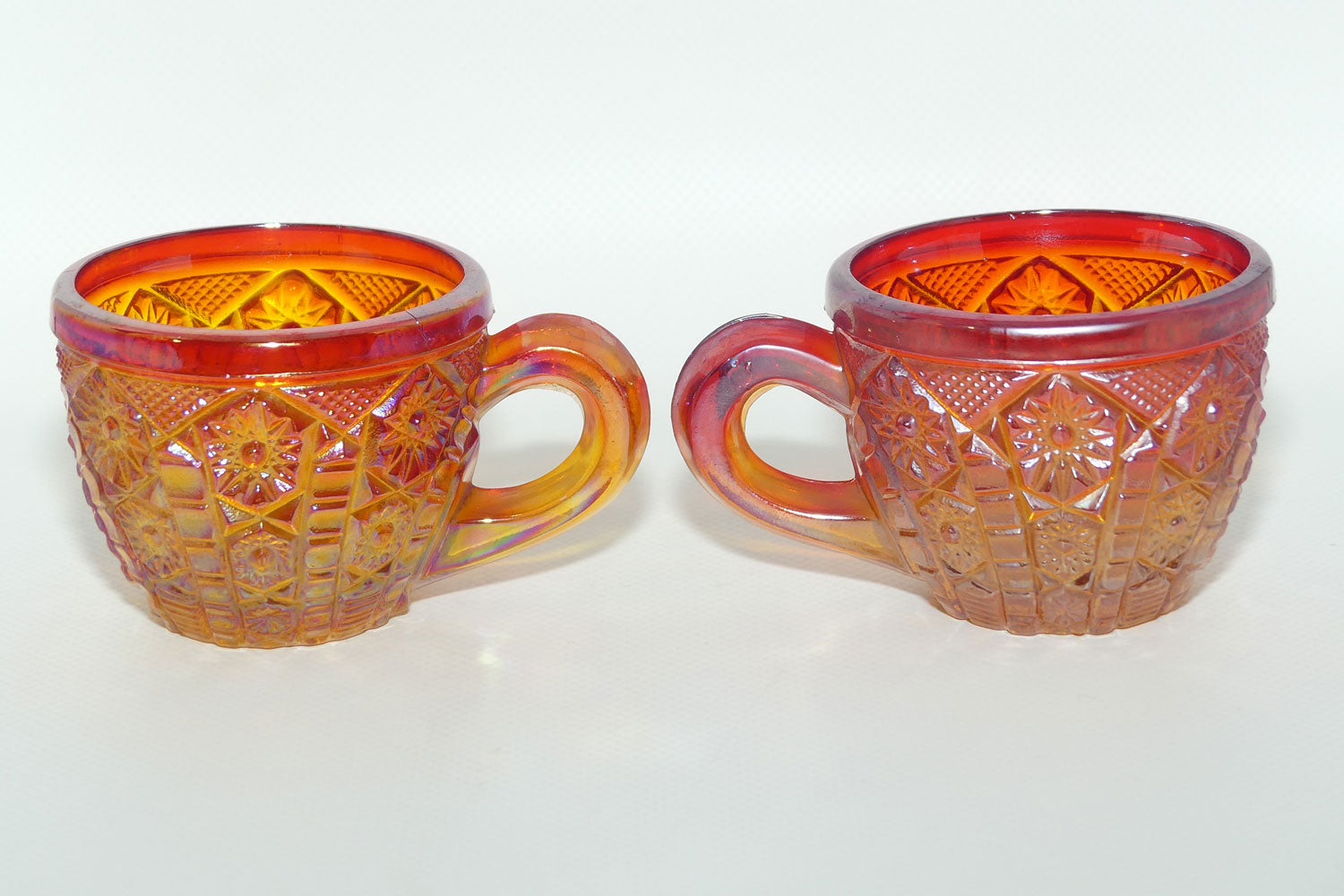 Pair of Indiana Carnival Glass cups | Red Amberina | Heirloom pattern