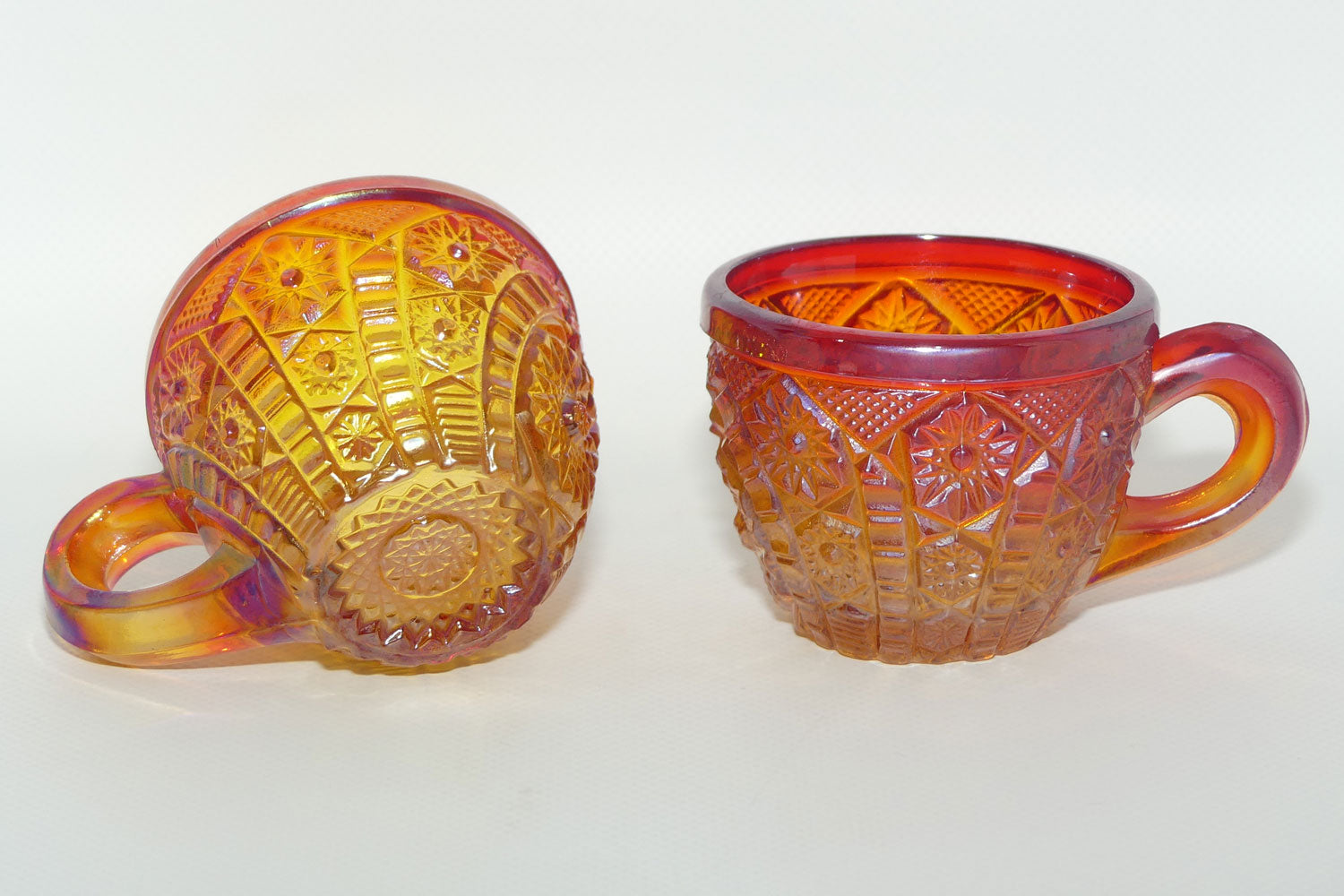 Pair of Indiana Carnival Glass cups | Red Amberina | Heirloom pattern