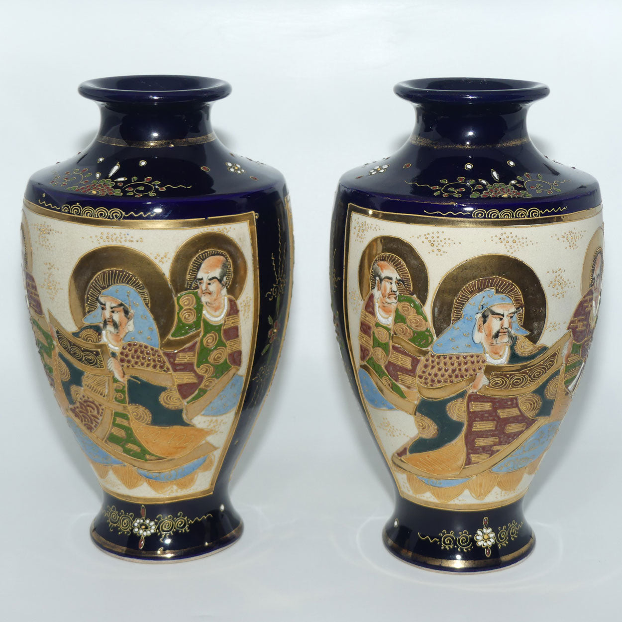 Early 20th century Satsuma pair of large bulbous vases | decorated with matching mirror image with enamelling and gilt highlights
