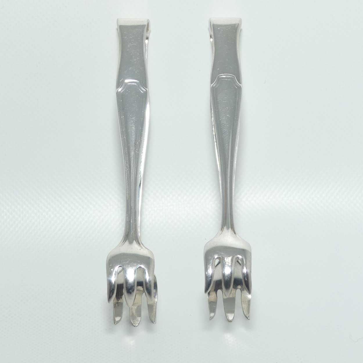 Two sets of small Silver Plated EPNS claw type sugar tongs