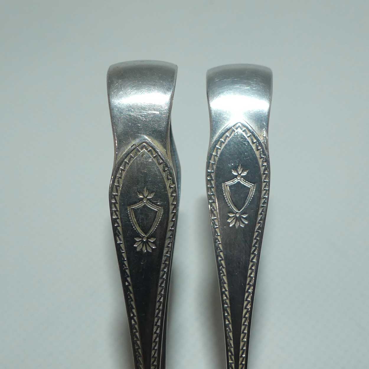 Matched Pair of Walker Hall & Sons silver plated sugar tongs