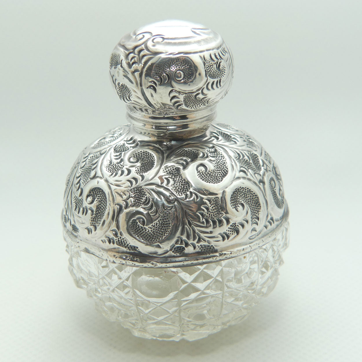 Sterling Silver and Cut Crystal perfume or cologne bottle | London 1911