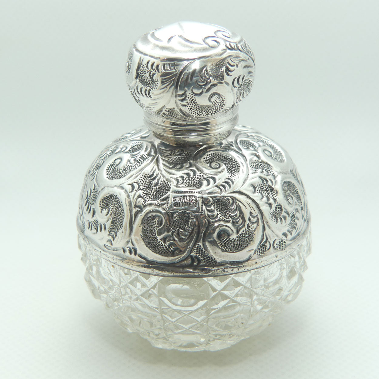 Sterling Silver and Cut Crystal perfume or cologne bottle | London 1911
