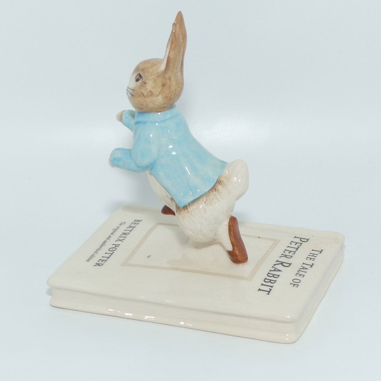 Beswick Beatrix Potter Peter on His Book