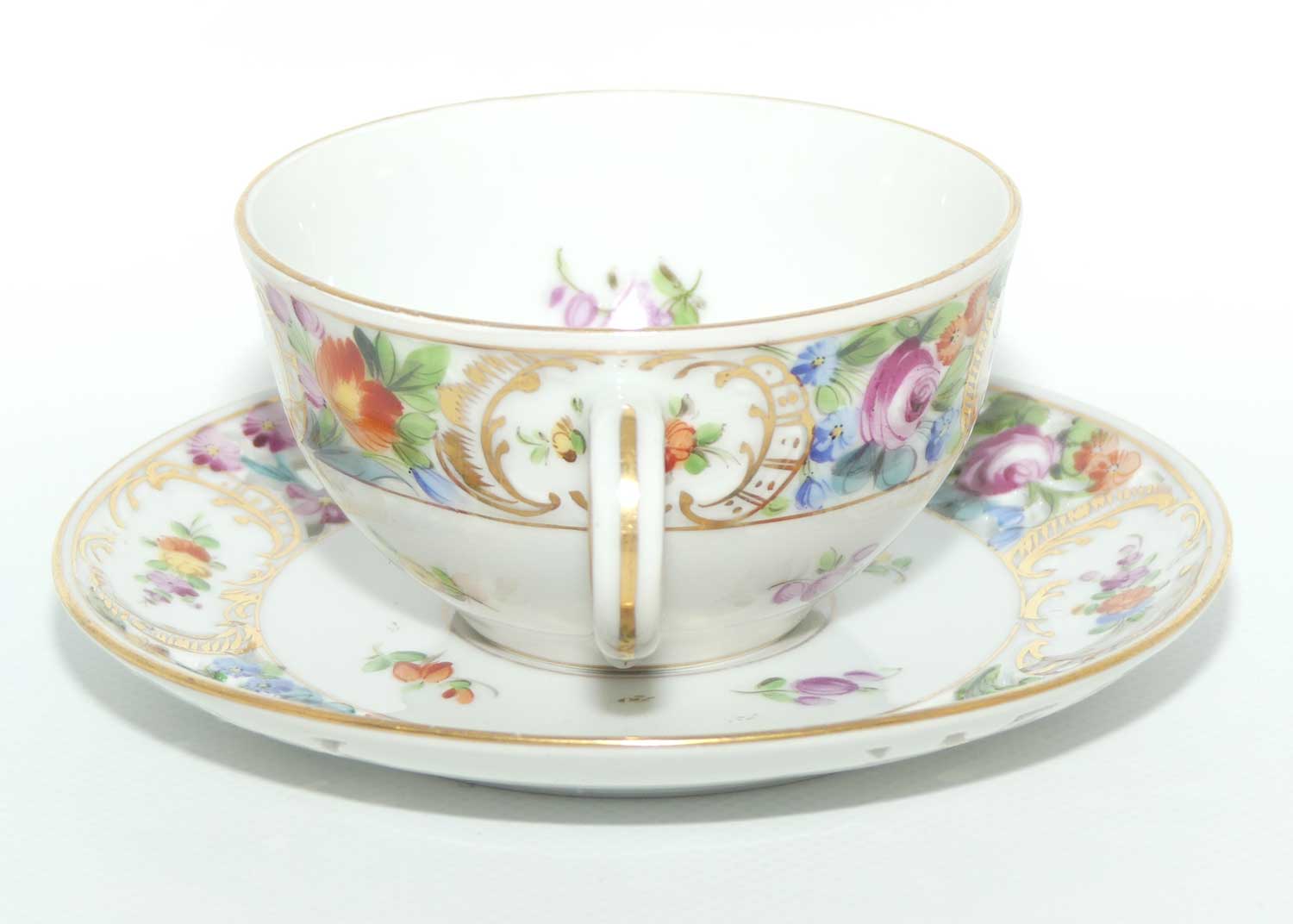 Exquisite pierced gallery Dresden floral cup and saucer