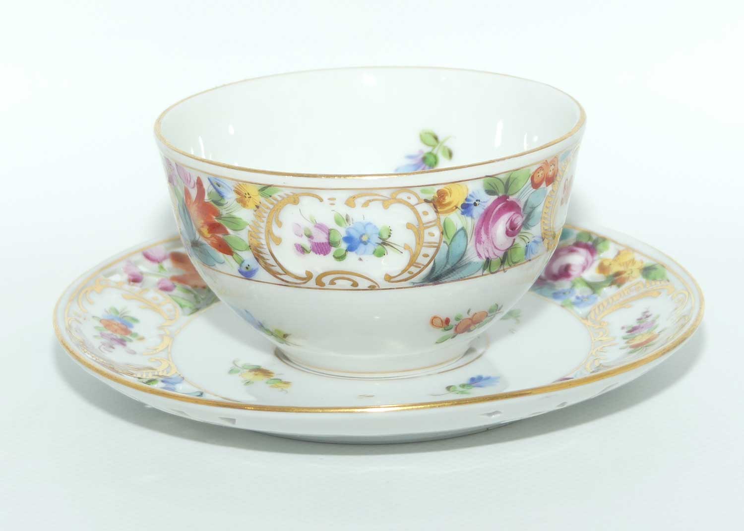 Exquisite pierced gallery Dresden floral cup and saucer