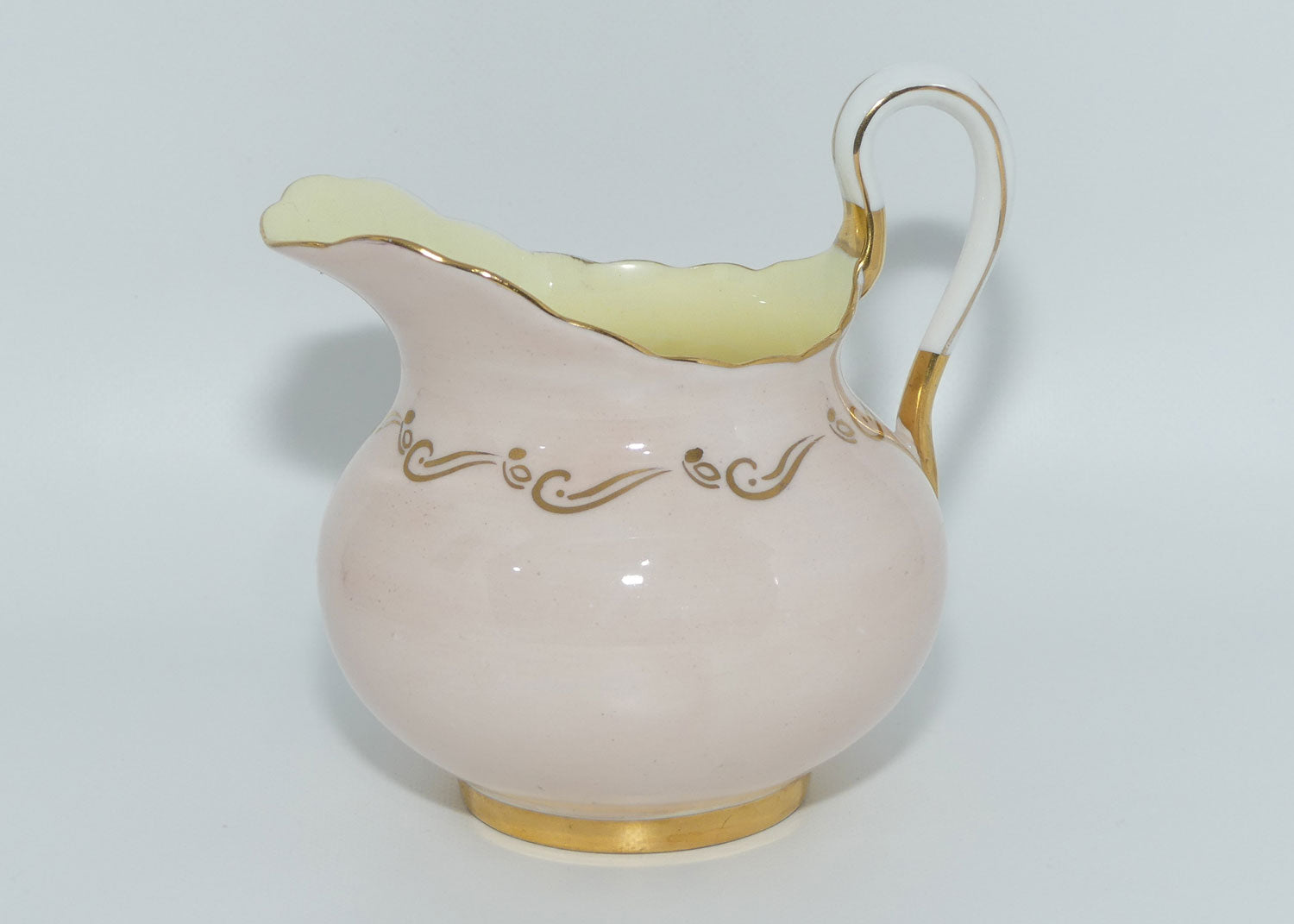 Tuscan Fine English Bone China Pink and Gilt Swirl milk and sugar | Fancy handle | Yellow Interior