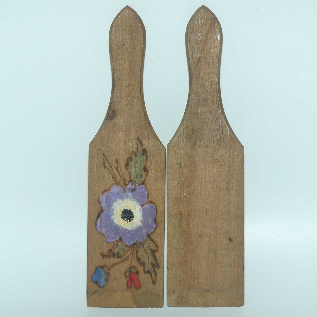 Pair of Australiana Pokerwork decorated butter pats