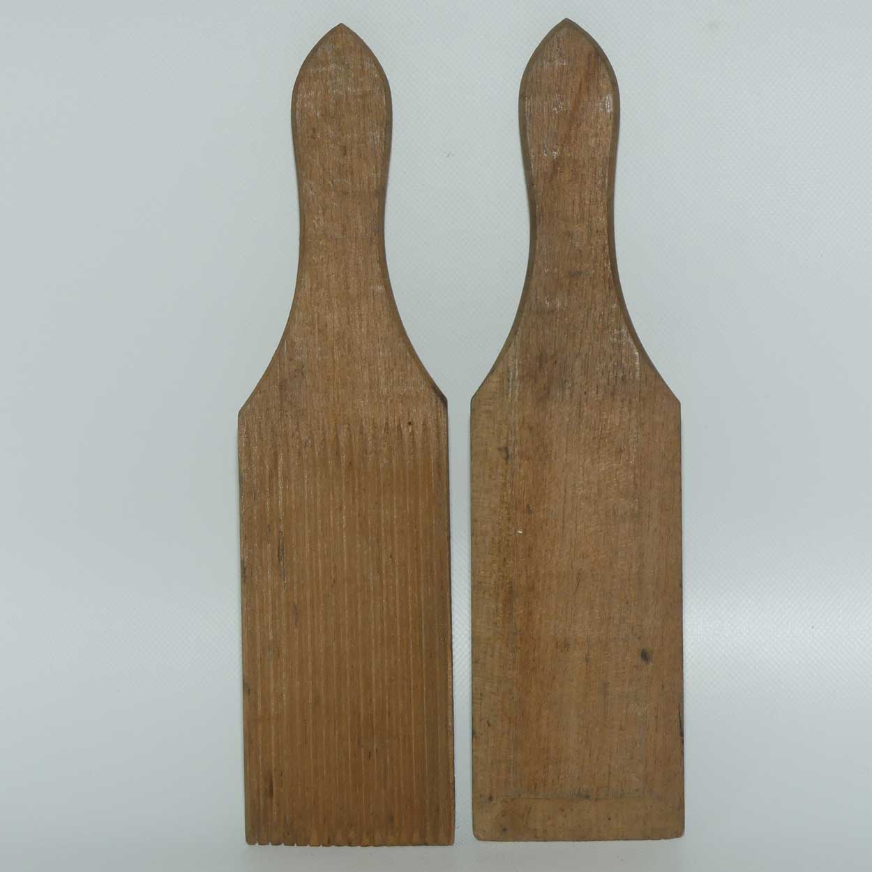 Pair of Australiana Pokerwork decorated butter pats