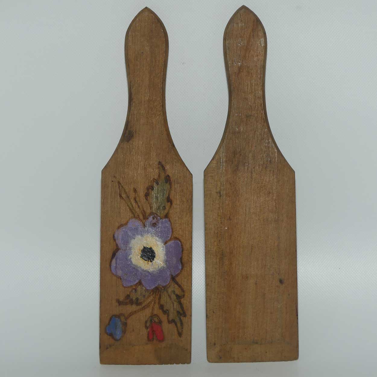 Pair of Australiana Pokerwork decorated butter pats