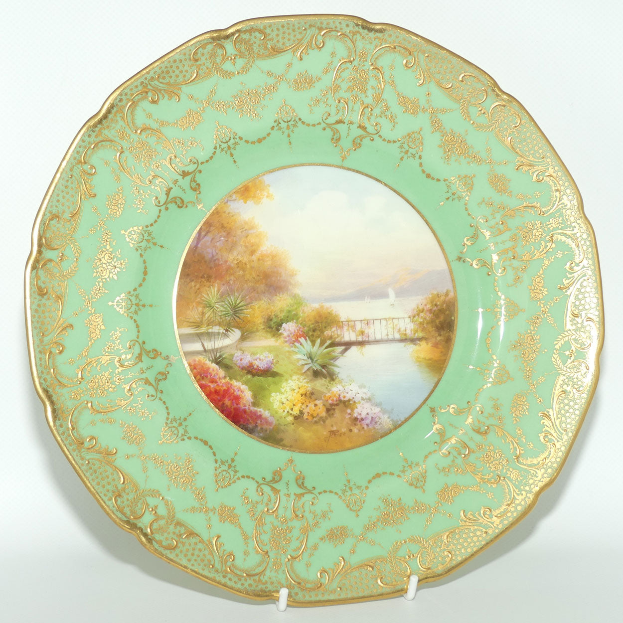 Royal Doulton hand painted and gilt Lake, Bridge & Garden plate (Price)