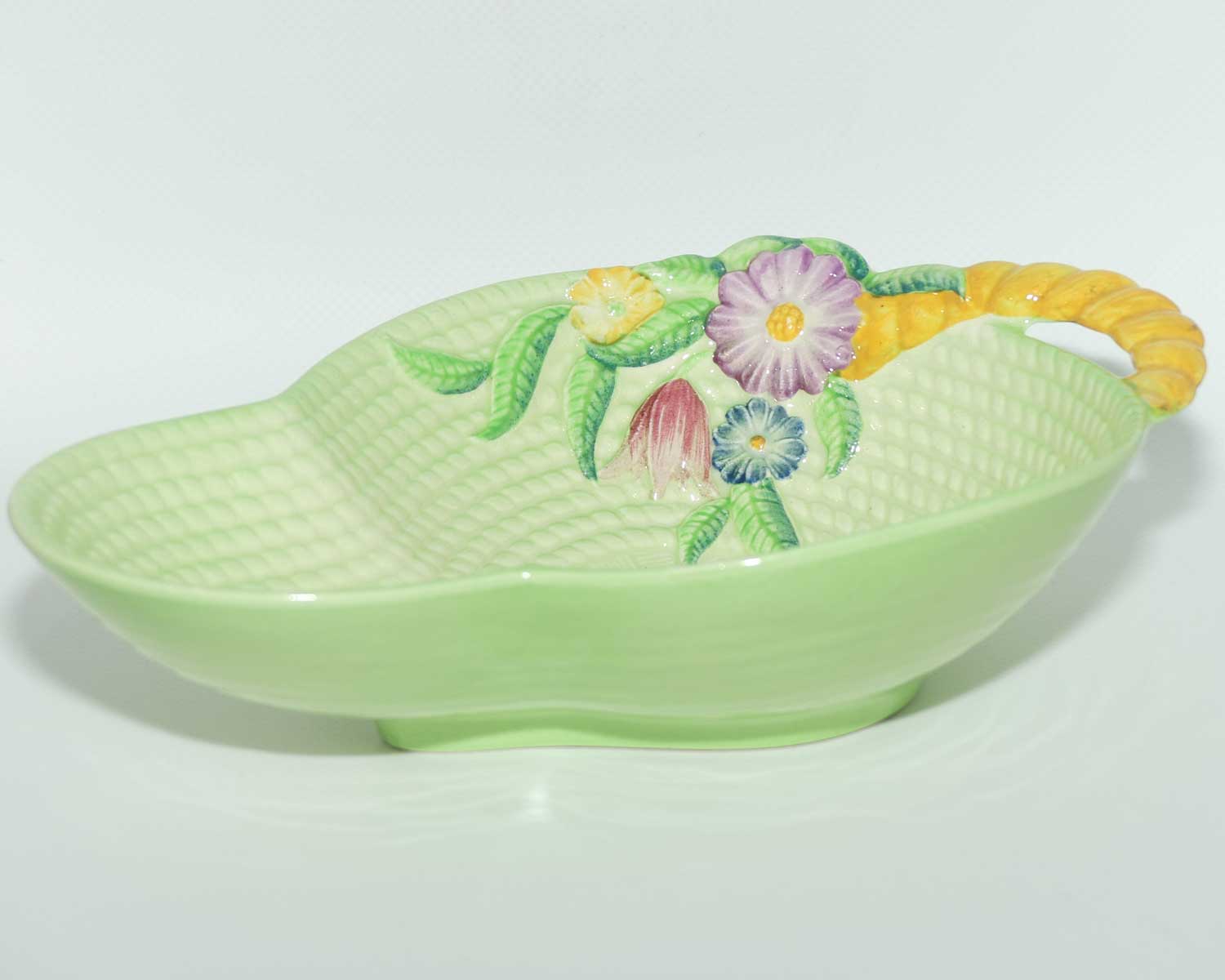 Carlton Ware Embossed Floral and Basket weave bowl with Yellow Handle