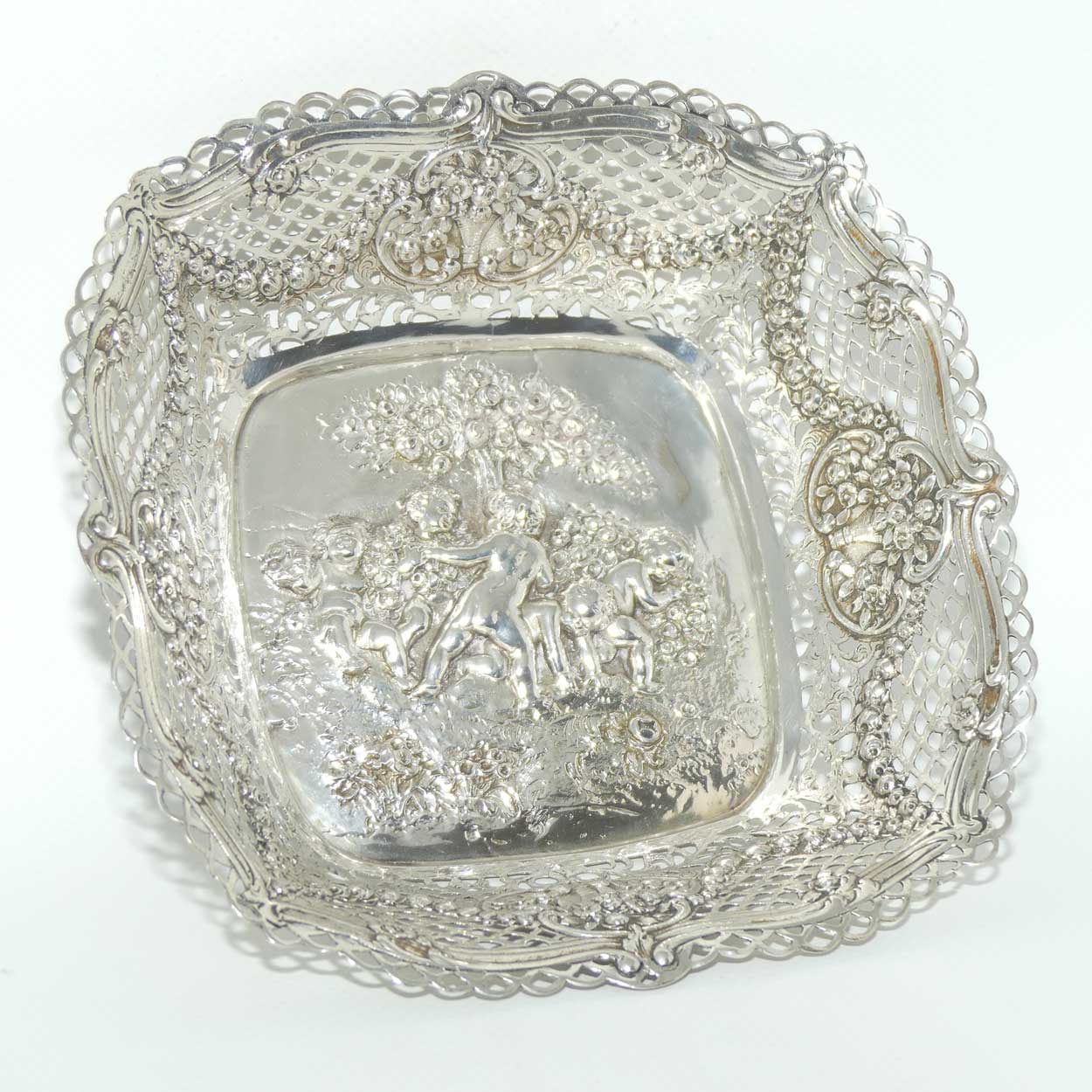 German 800 Silver beautiful reticulated dish depicting Putti at Play