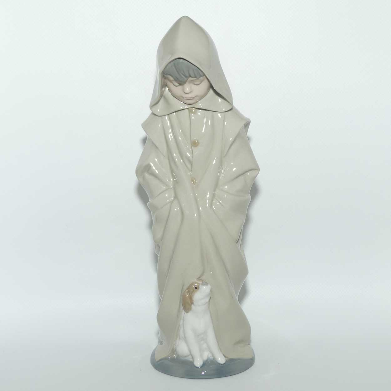 Nao figure Boy in Raincoat with Puppy Dog at Feet