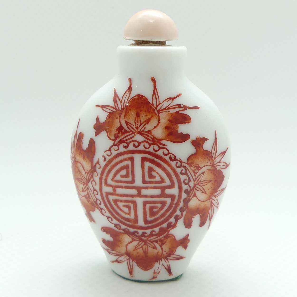 Chinese Red Floral pattern Snuff Bottle | Pink stone stopper