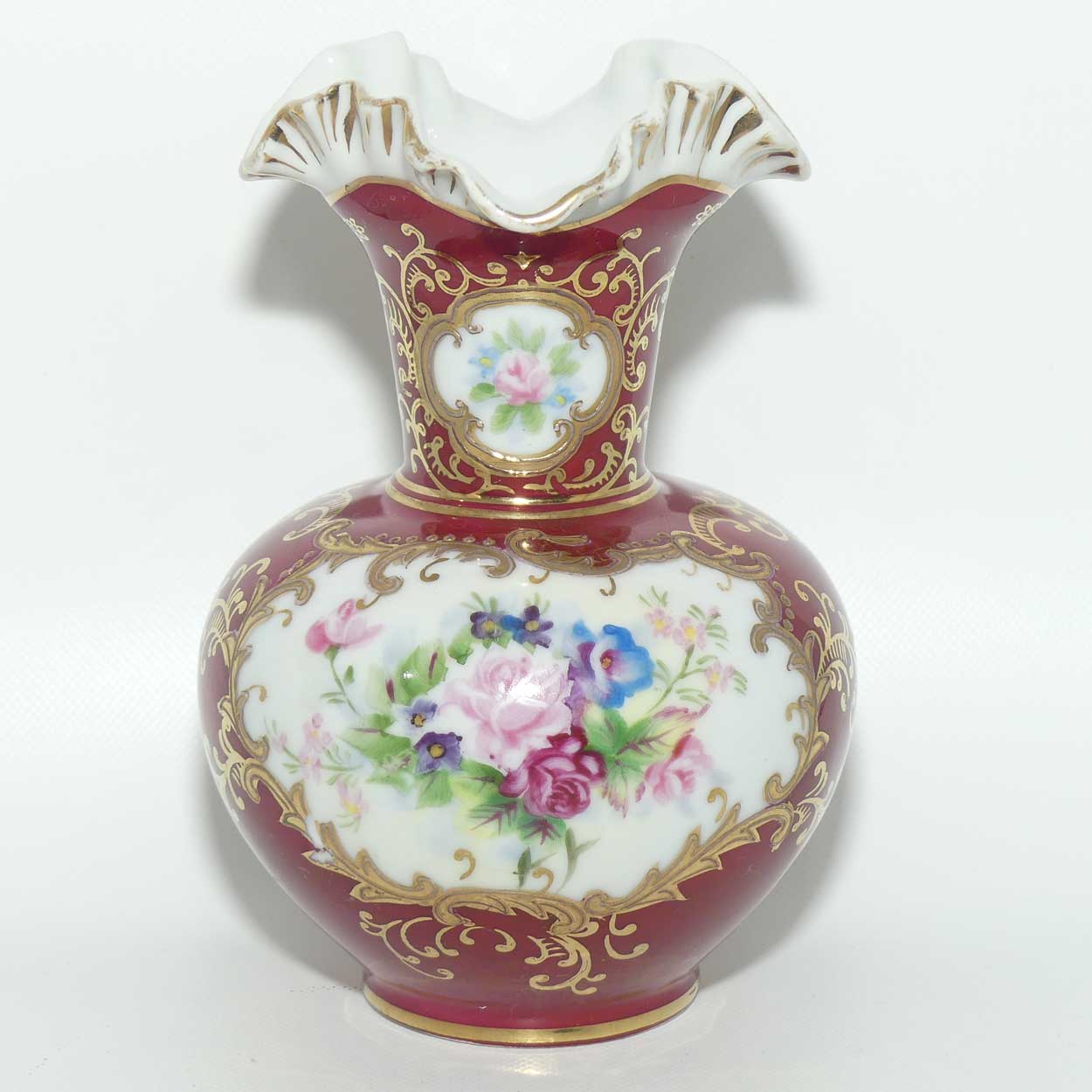 European Floral decorated Hand Painted and Gilt fluted rim vase