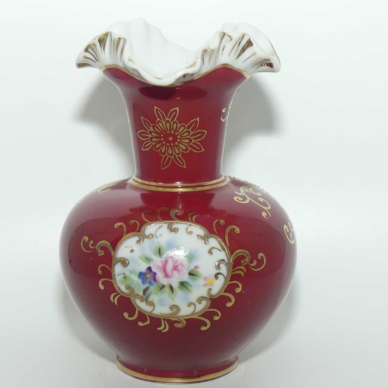 European Floral decorated Hand Painted and Gilt fluted rim vase
