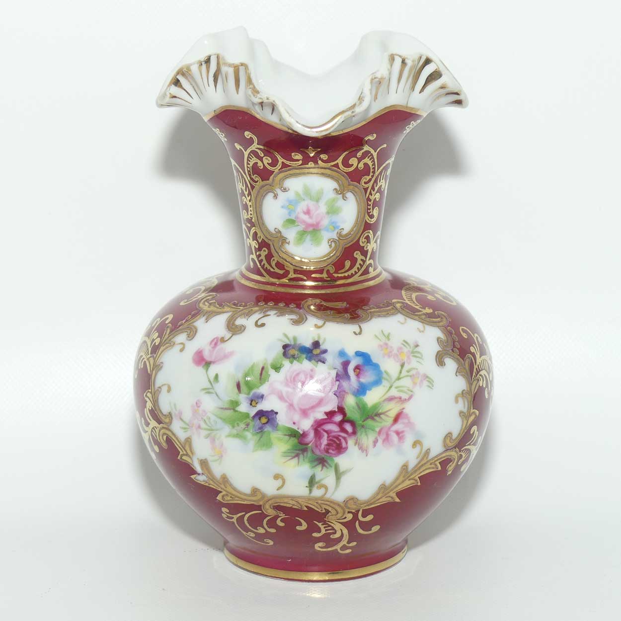 European Floral decorated Hand Painted and Gilt fluted rim vase