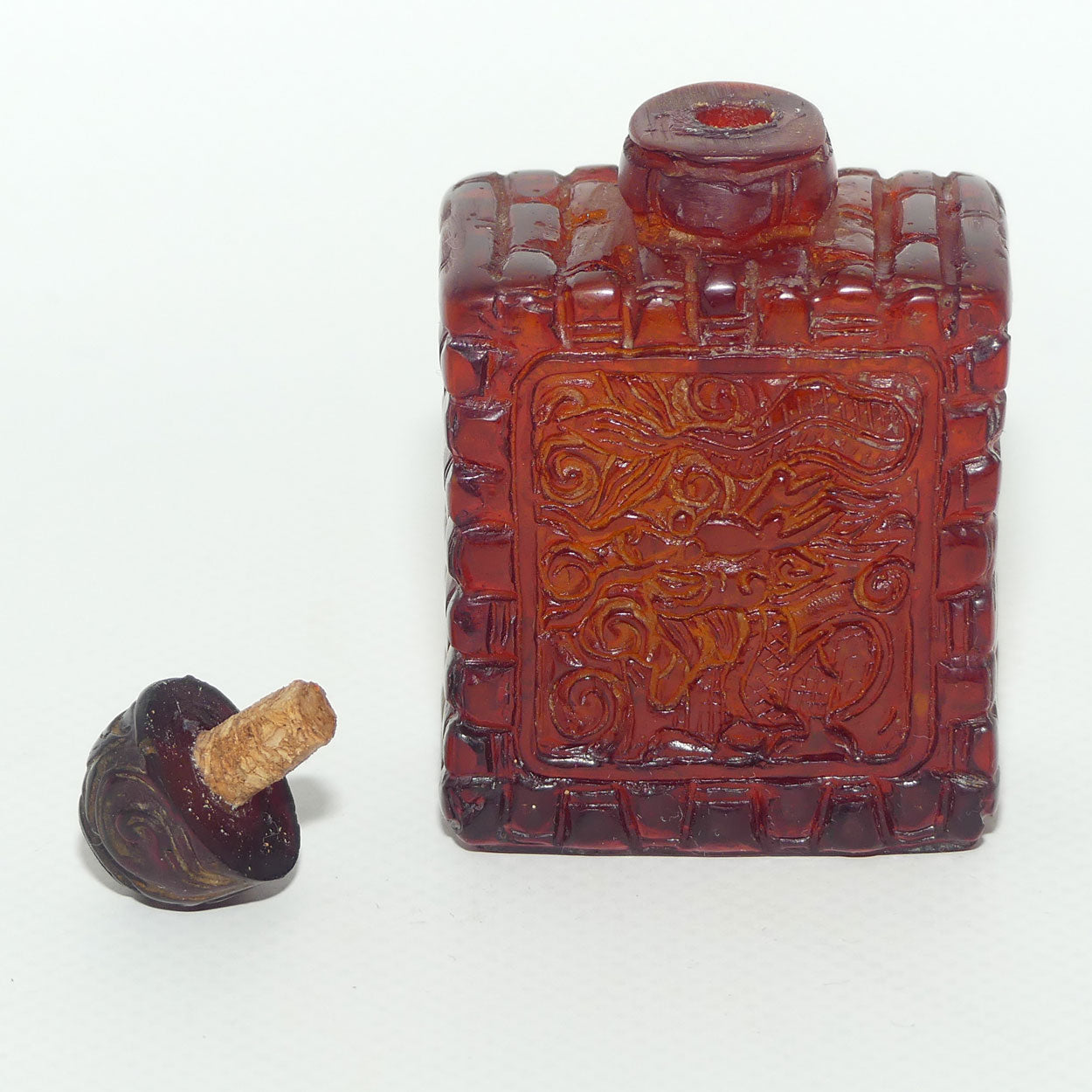 Chinese Snuff Bottle | Carved Amber in Square form with Stopper