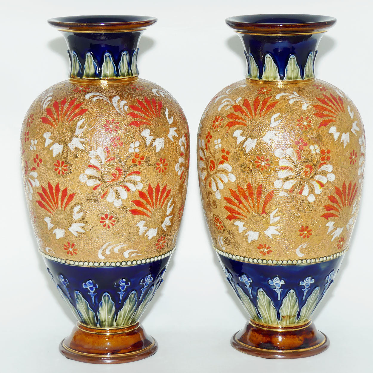 Royal Doulton stoneware pair of bulbous vases with red & white enamelled flowers, gilt highlights, applied leaves & dots (stamped 4461)
