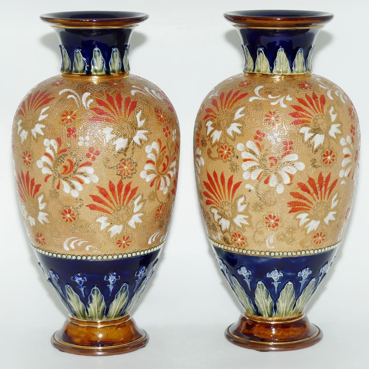 Royal Doulton stoneware pair of bulbous vases with red & white enamelled flowers, gilt highlights, applied leaves & dots (stamped 4461)