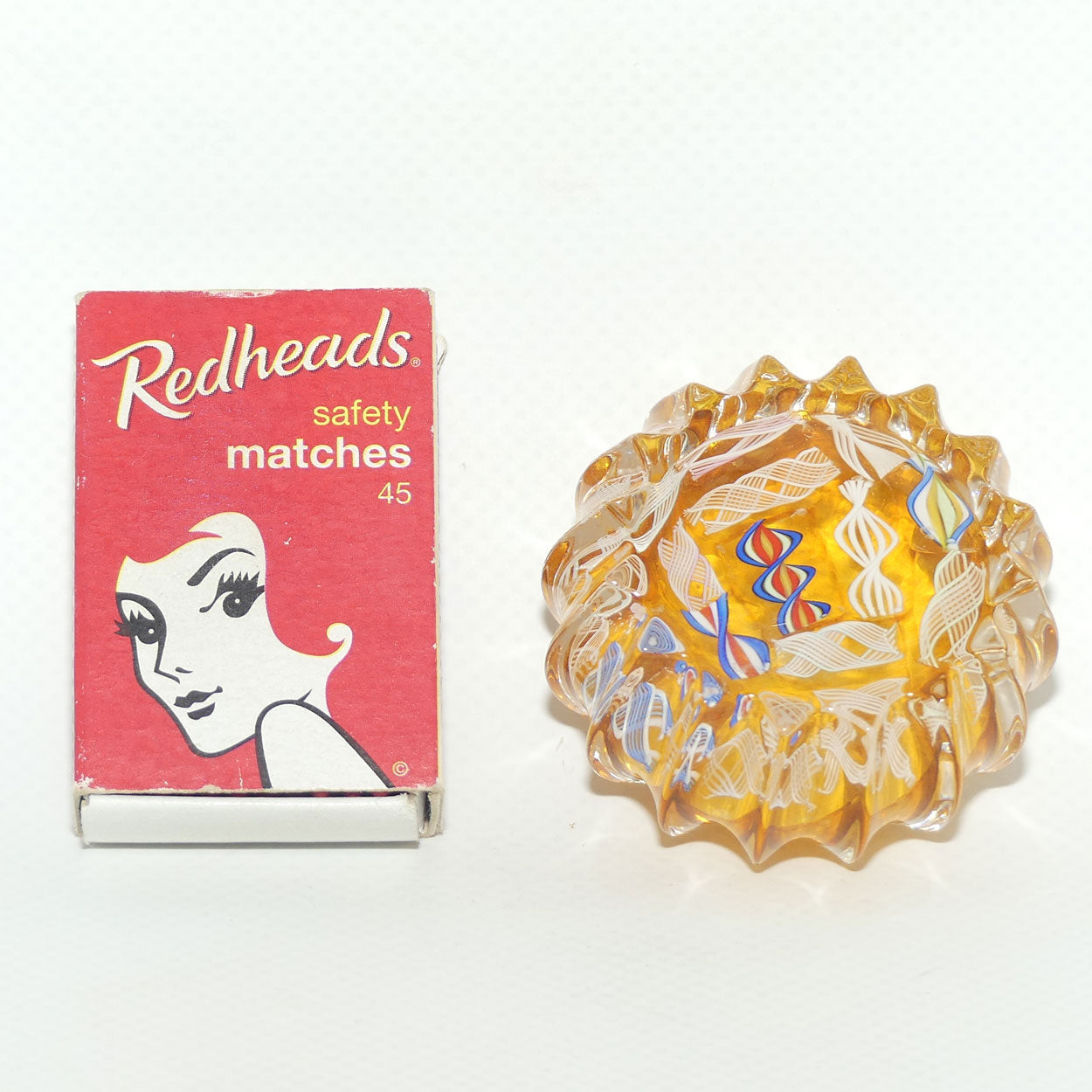 John Deacons Scotland Latticino Ribbed miniature paperweight | Amber