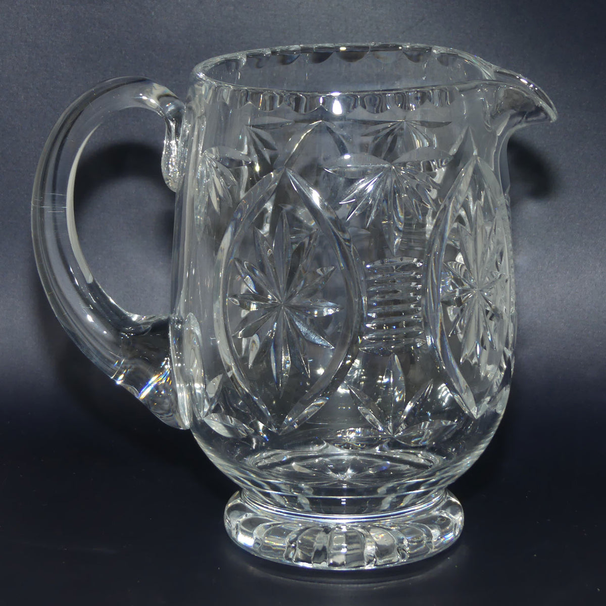 Webb Corbett Crystal | Beautifully facetted Star pattern round body Crystal water jug