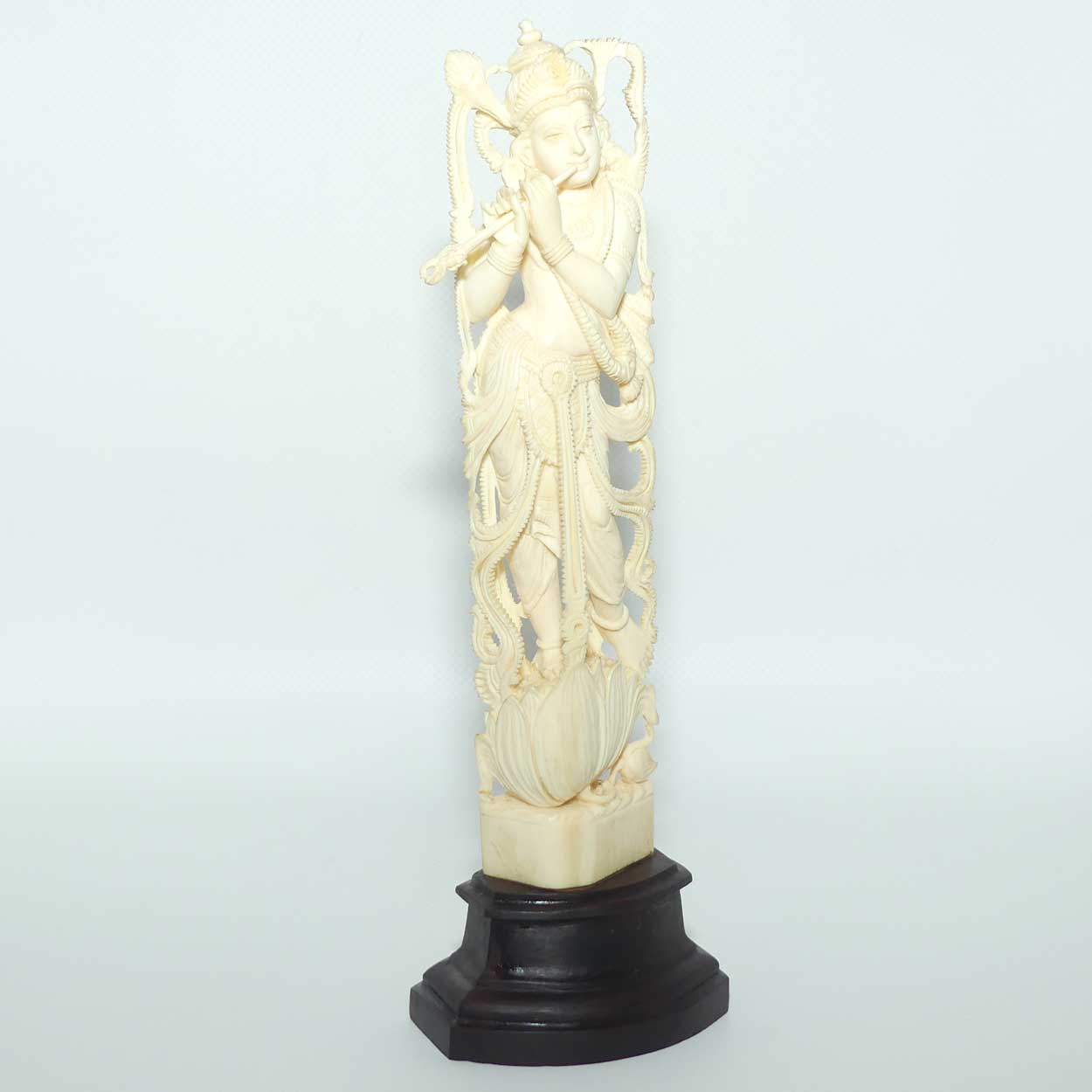 Indian Carved Ivory figure of Krishna, atop a Lotus with Flute | 23.5cm tall
