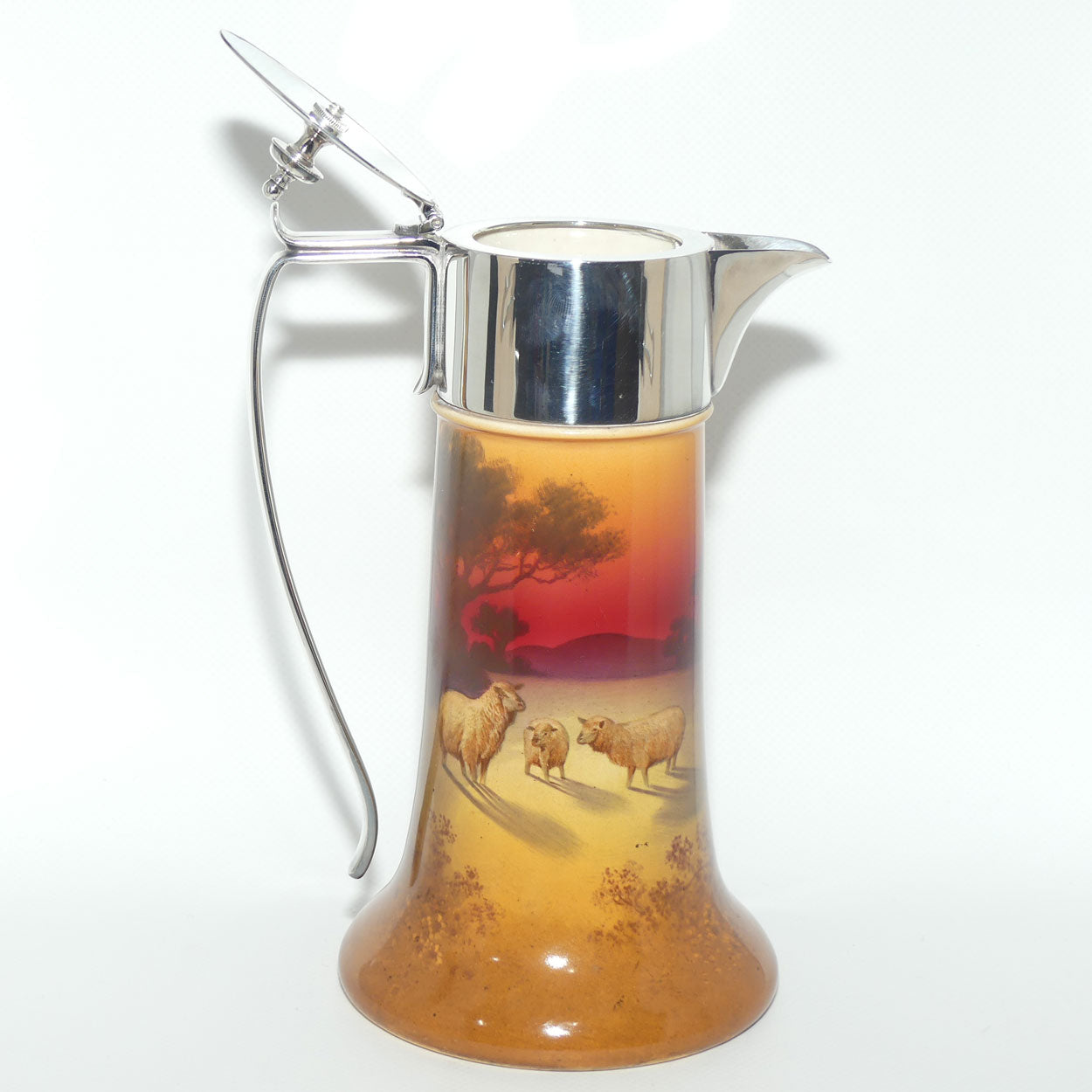 Royal Doulton hand painted Sheep claret jug with EPNS mounts