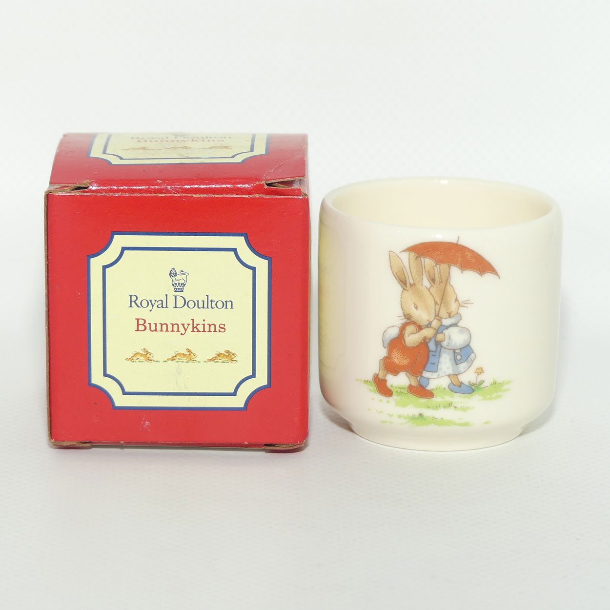 Royal Doulton Bunnykins egg cup | boxed | Sheltering under Umbrella | Drummer