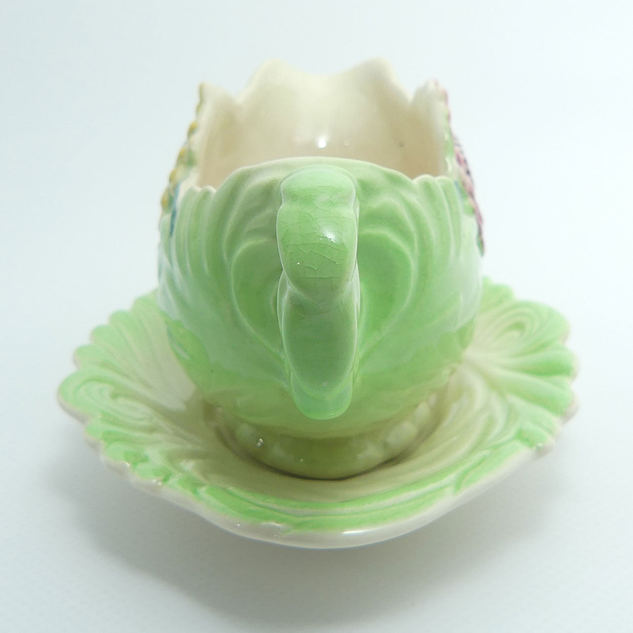 Shorter and Son Staffordshire Floral embossed mayonnaise jug and saucer