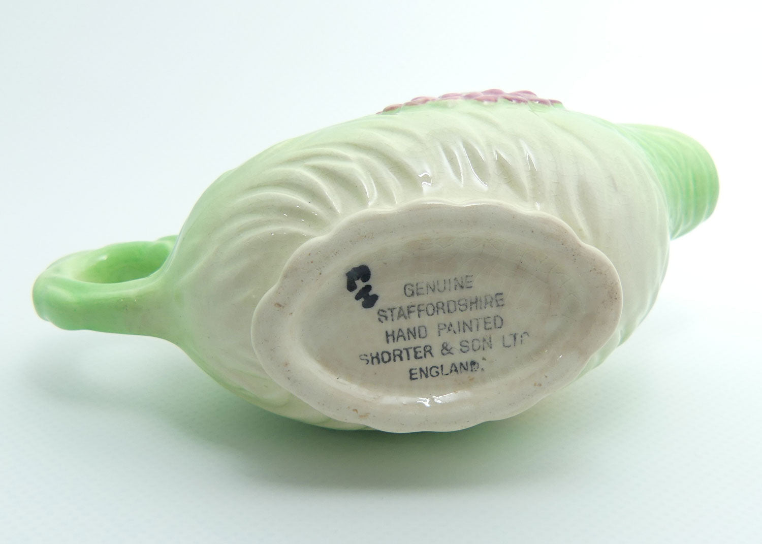 Shorter and Son Staffordshire Floral embossed mayonnaise jug and saucer